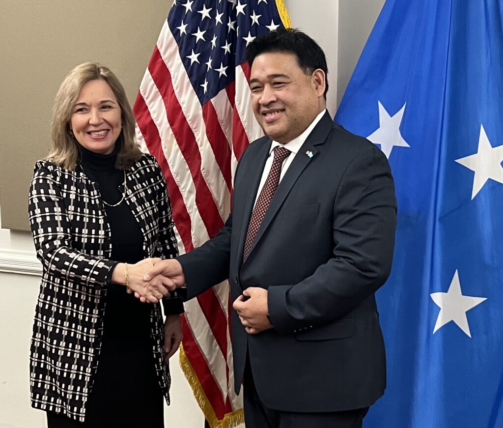 U.S. Assistant Secretary for Insular and International Affairs Carmon Canto (left) and FSM Deputy Chief of Mission Jackson Soram (right) shake hands at the MOU signing in Washington. 
